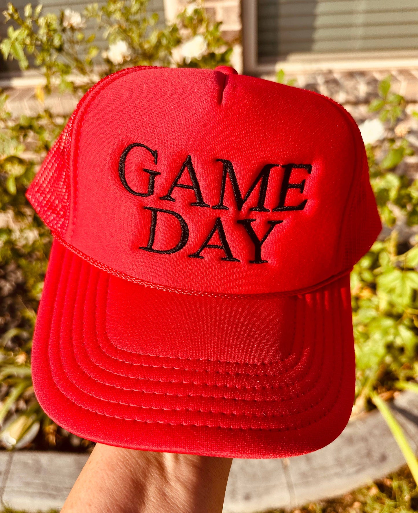 Game Day Embroidered Trucker Hat: Red Hat/Black Thread